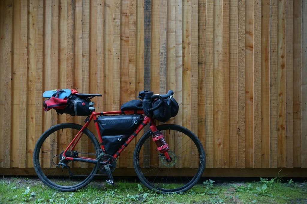 Thompson R9300 loaded up in front of some wood panelling