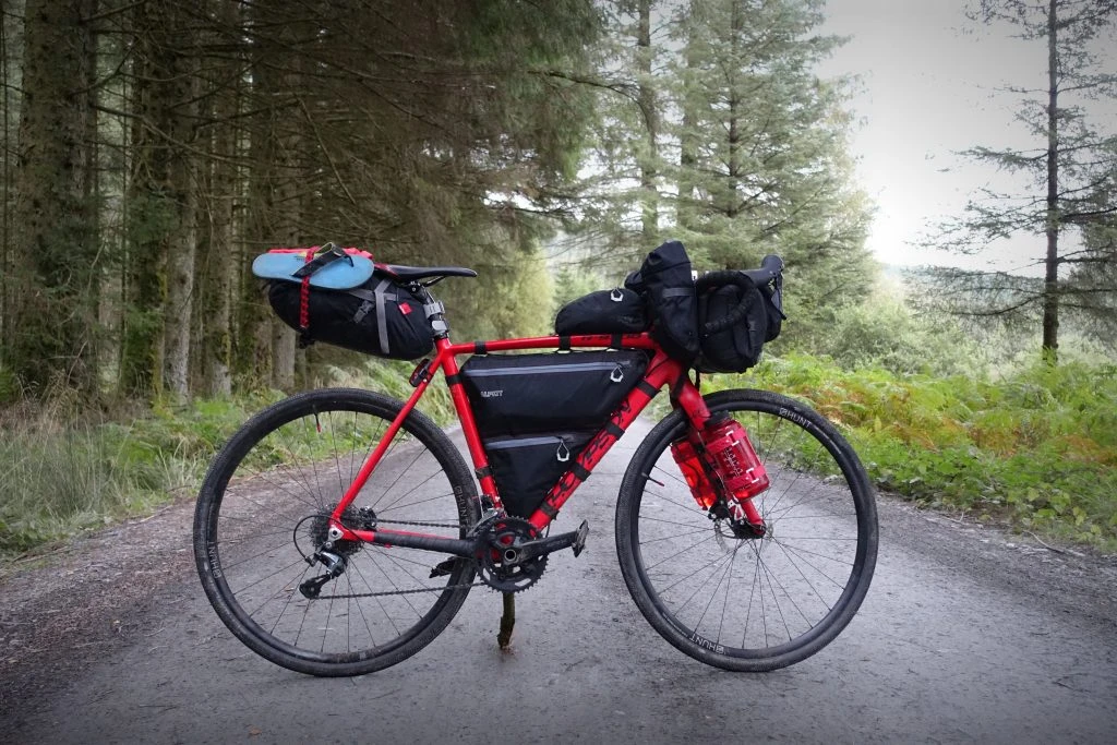 Thompson R9300 loaded up with Alpkit luggage on the Raiders Road